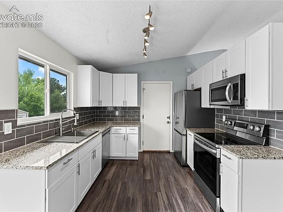 4th image of 5647 Trout Creek Pass Dr