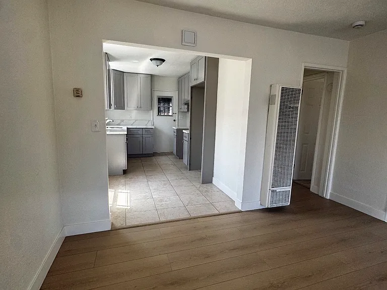 Bright, Open Living Space with Laminate Flooring