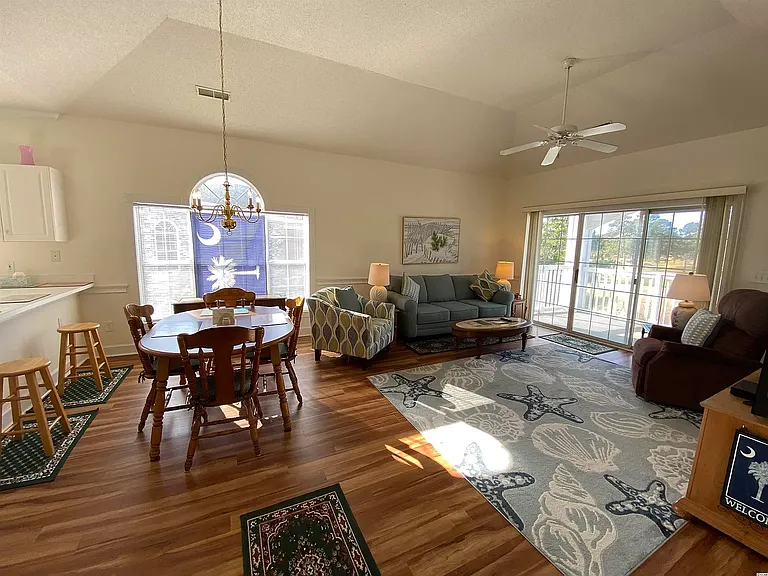 Spacious living room with vaulted ceilings.
