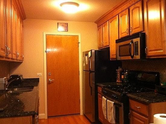 Kitchen with granite and stainless steel appliances
