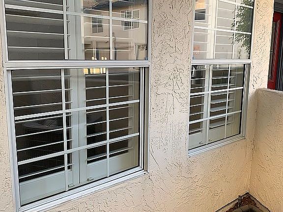 Exterior windows w/shutters