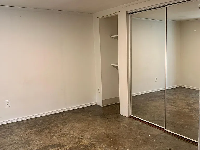 11X12' BEDROOM WITH MIRRORED CLOSET DOORS & 2 STORAGE SHELVES (OTHER IS TO RIGHT OF CLOSET)