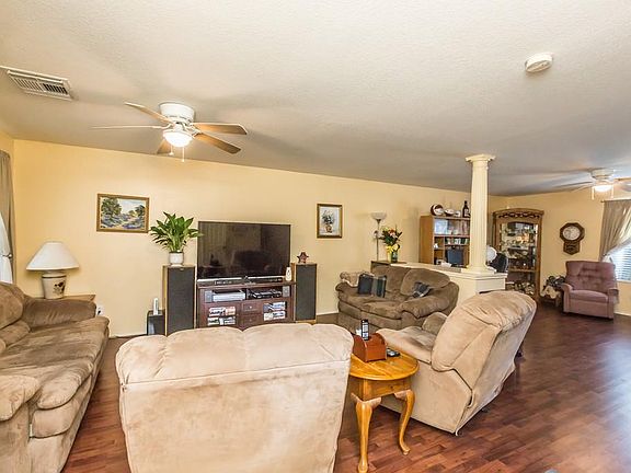 As you walk in the front entryway, you see your living room to the left.