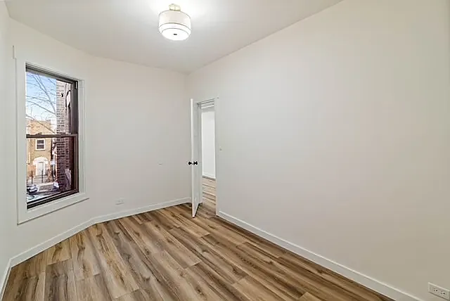 Building Photo - 1018 N Harding Ave #2