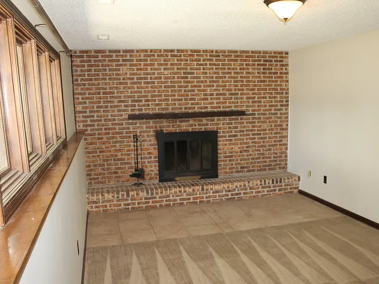 View 2 of the family room lots of nice natural lighting and easy visibility to back yard.