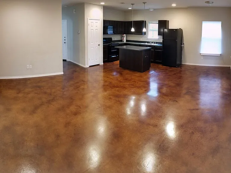 Living room, dining area and kitchen
