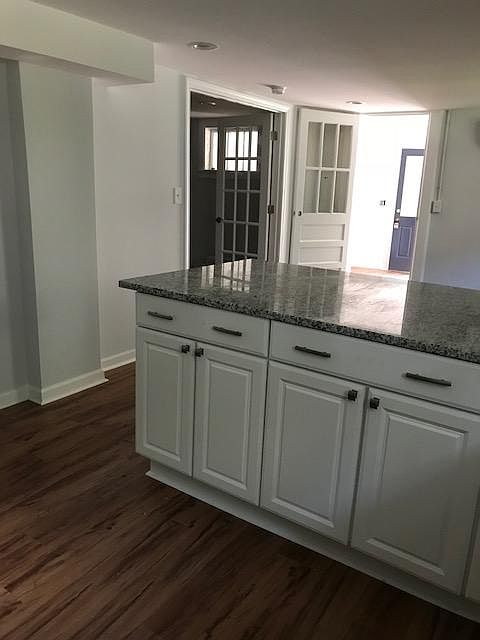Kitchen counter looking towards sun room/office