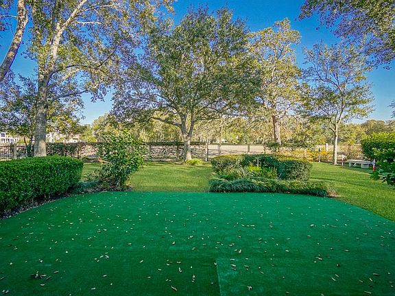 Large backyard with beautiful mature trees and the fabulous golf course views