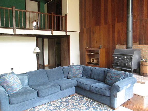 Family/Living room with cathedral ceiling.