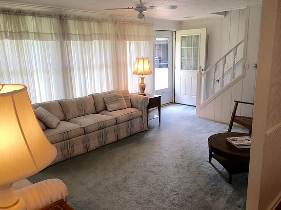 Stairs lead to bedrooms