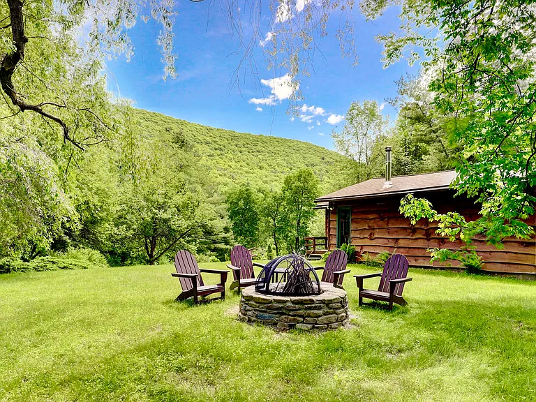 The fire pit and Adirondack chairs in the summertime.