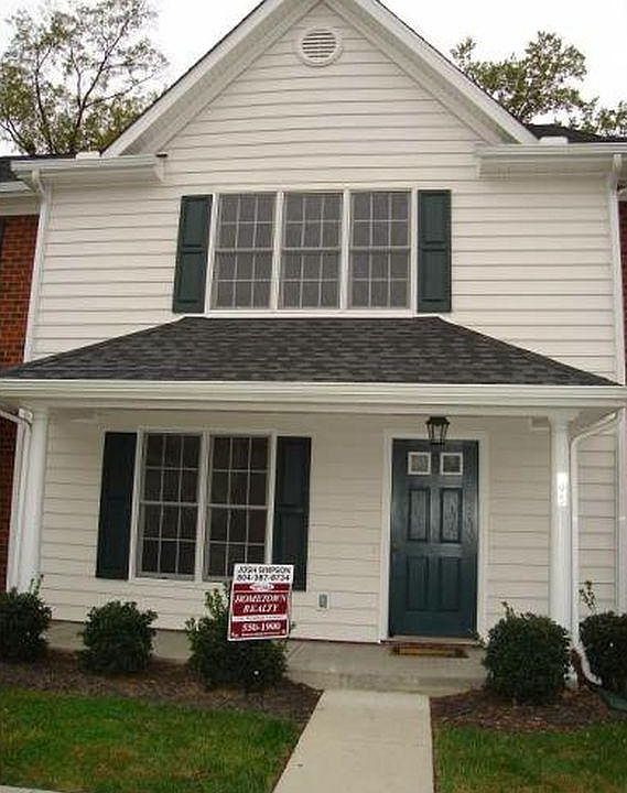 Front with large covered porch