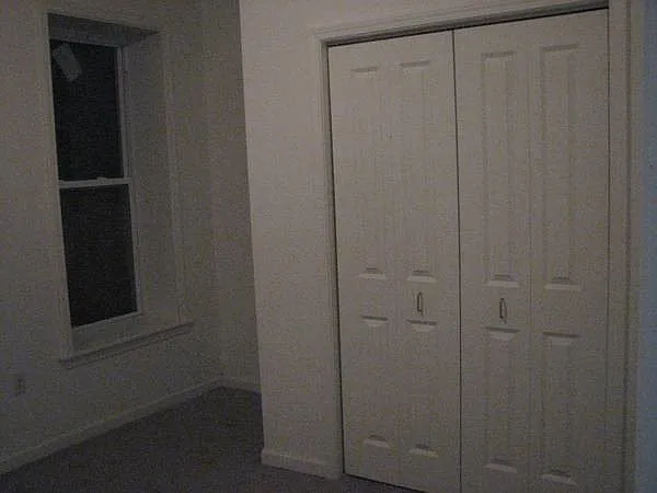 1 bedroom with 7 foot closet.
Second bedroom has a walkout to the fenced in back yard.
