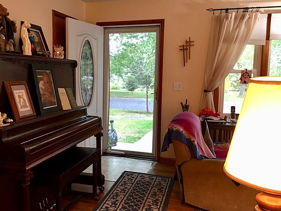 Lovely front living room all wood floors and wood trim
