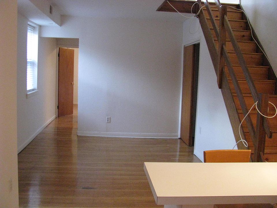 Closet in living room, Staircase to deck & fireplace, bedroom