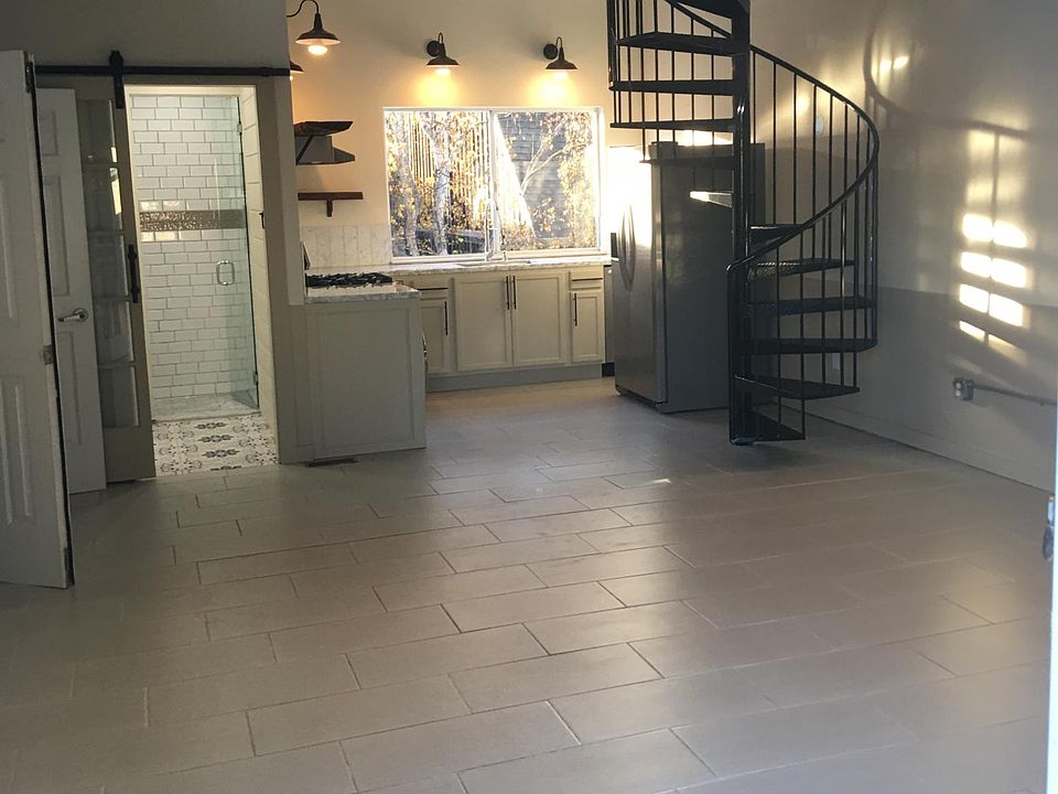 View from the balcony area towards the kitchen and bathroom