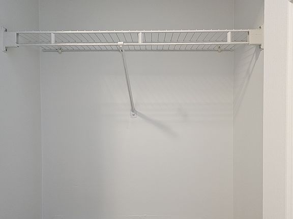 Coat Closet at the entrance with built in storage space