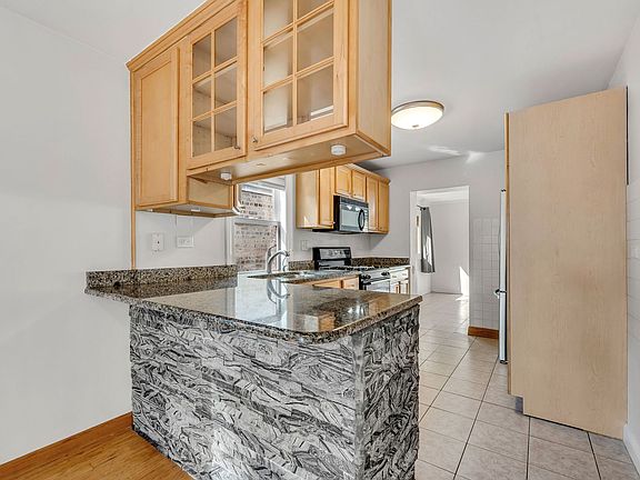 4th image of 5042 N Newland Ave