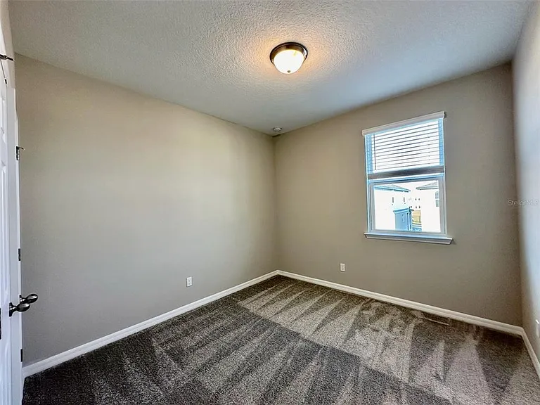 4869 Lacewing Dr — Photo 16