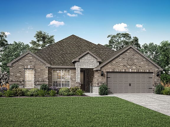 The Leland is a single story home with brick and stone.
