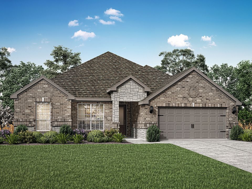 The Leland is a single story home with brick and stone.
