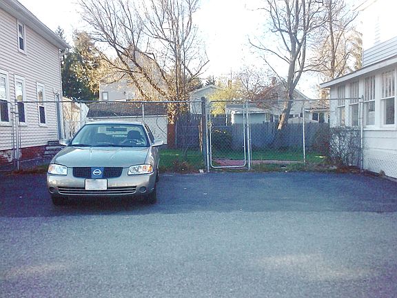 3 Off-Street Parking Spaces Between the Houses