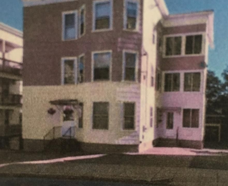 second floor with sunroom, playground/park behind. Beautiful