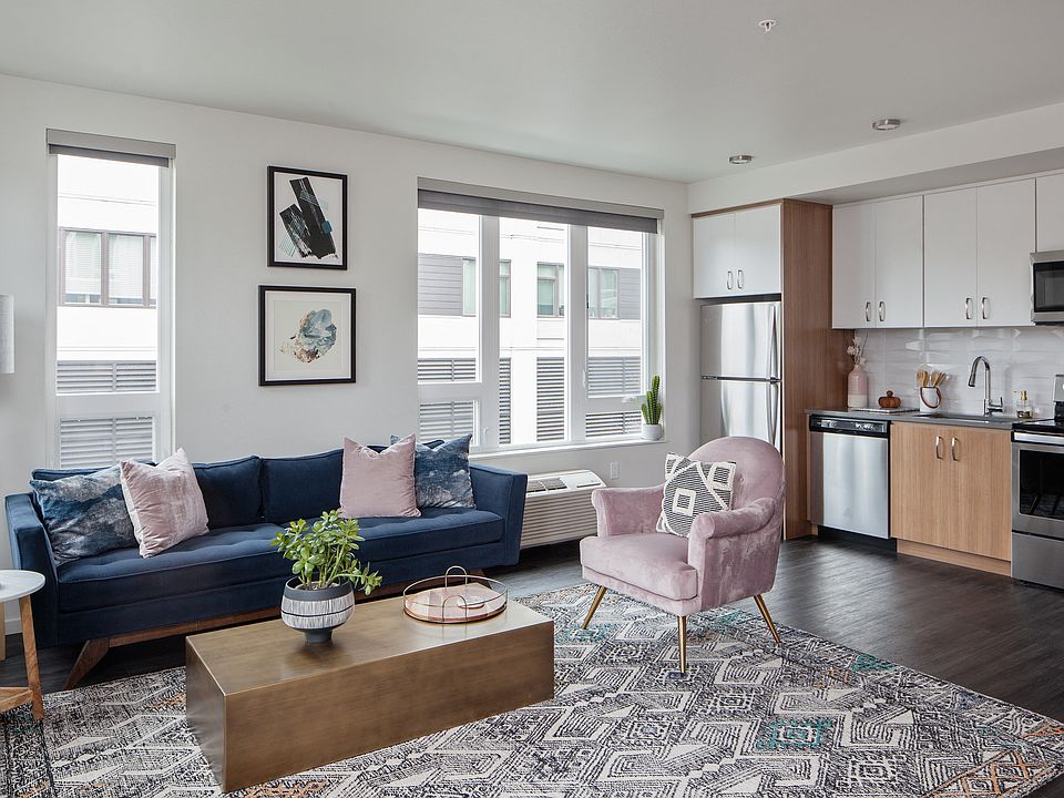Grand Park Village kitchen and living room shot