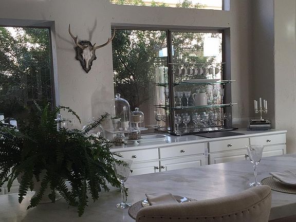 Extra large gourmet kitchen with massive marble island
