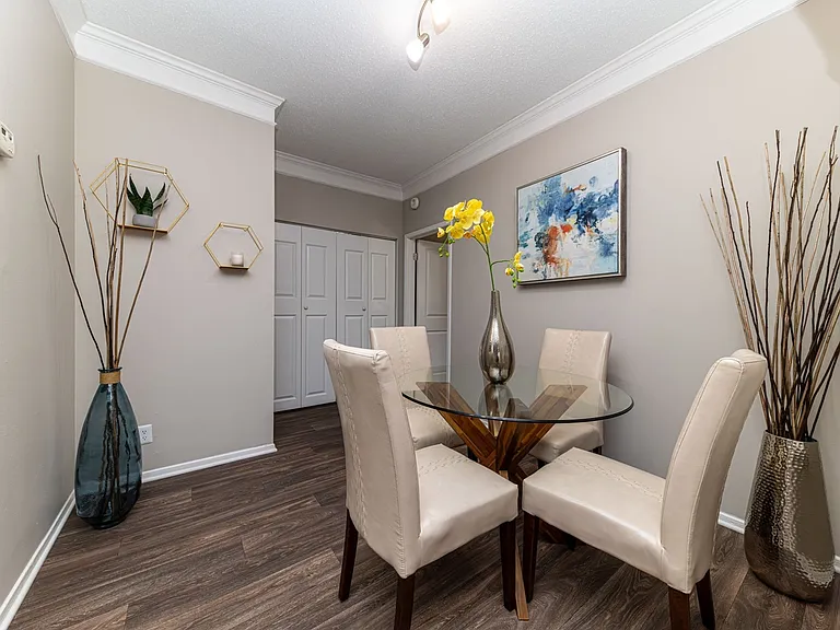 Dining area with hardwood-style flooring
