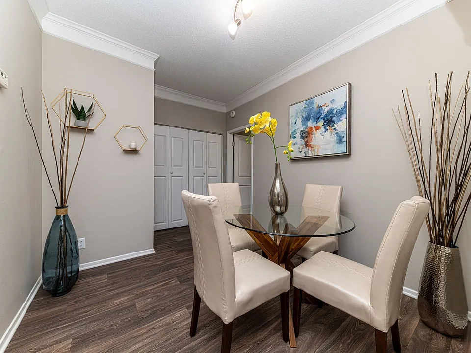 Dining area with hardwood-style flooring