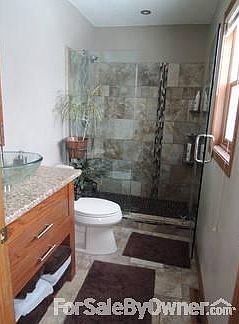 Master Bathroom (2012 Remodel)
						:
						Full Tile Shower, Kohler Toilet, Solid Oak Vanity with Vessel Sink & Granite Top