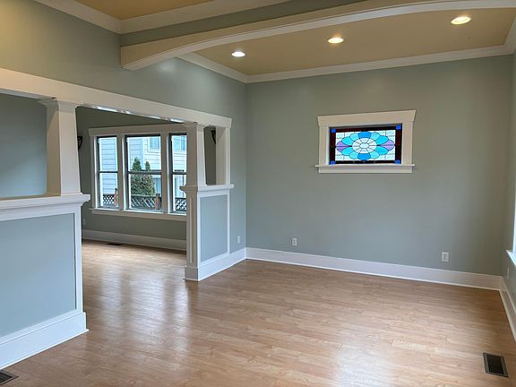 Living Room with multicolor glass medallion window