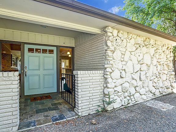 Walk into your dream home through the unique gated entrance and wide front door.