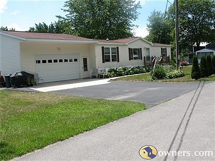 Road view shows your nice blacktop driveway...