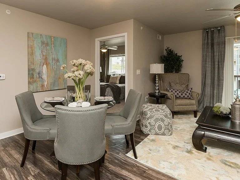Make it yours_this spacious open layout offers plenty of room for dining, relaxing, and easy access to your private bedroom.
