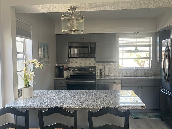 2nd image of 9940 47th Ave N APT 207
