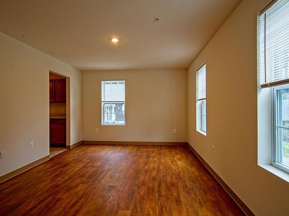 FRONT ROOM WITH 3 WINDOWS