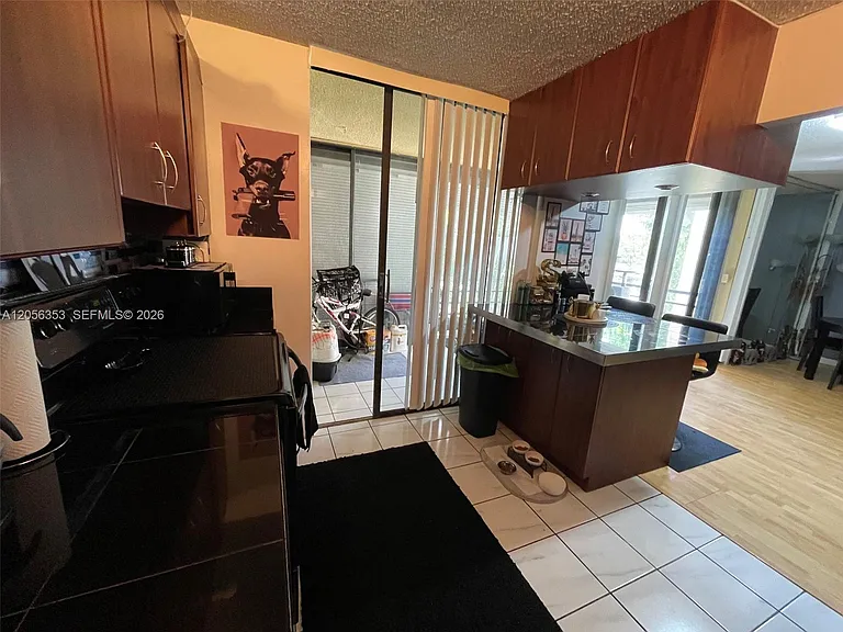671 NE 195th St #207 — Photo 13