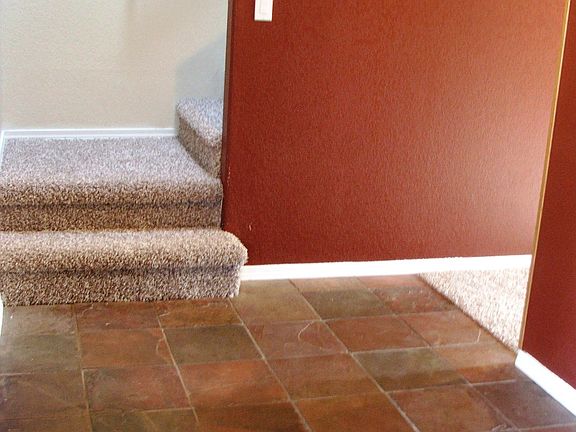 New carpet a fresh coat of paint, and the slate enty make an inviting entry!