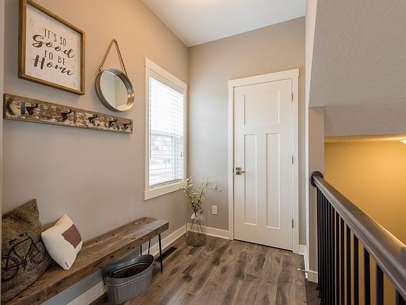 Plenty of room for guests to sit and take their shoes off and hang up their coat!