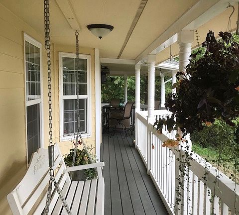 front porch with porch swing