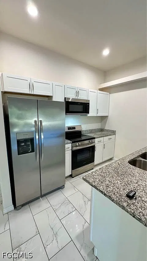 3309 SW 15th Pl — Photo 2
