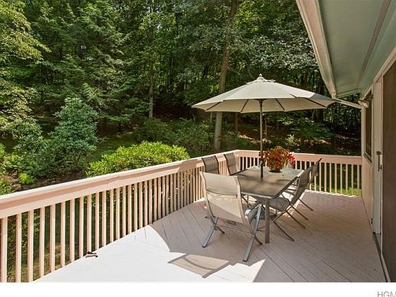 Enjoy the peace and quiet on your back yard deck in the summertime.