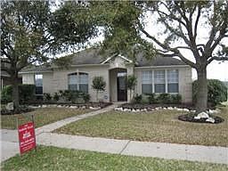 Immaculate Ryland "Canterbury" with a detached garage located on a wooded, corner lot.