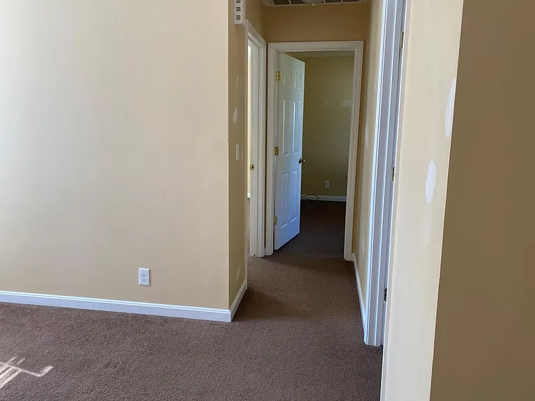 Hallway to bedroom 1 & 2
Bathroom on the right