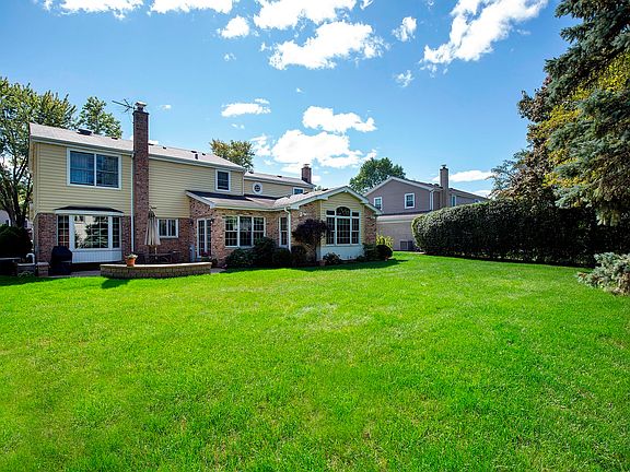 Huge yard with beautiful landscaping.