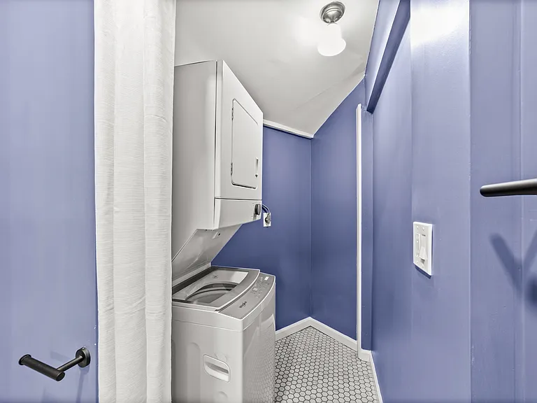 Laundry room connected to bathroom