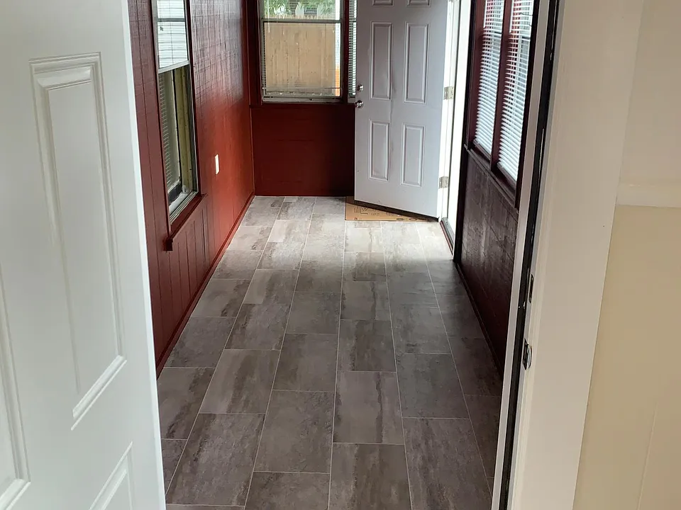 View of porch from kitchen entry door