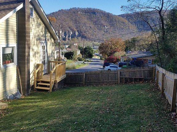Side yard with small porch